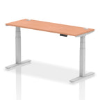 Adjustable height desk with wood-effect top and metal legs on a white background