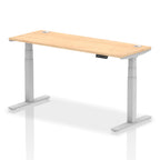 Adjustable height desk with wood-effect top and metal legs on a white background
