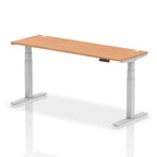 Adjustable height desk with wood-effect top and metal legs on a white background