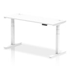 Adjustable height desk with white top and metal legs on a white background