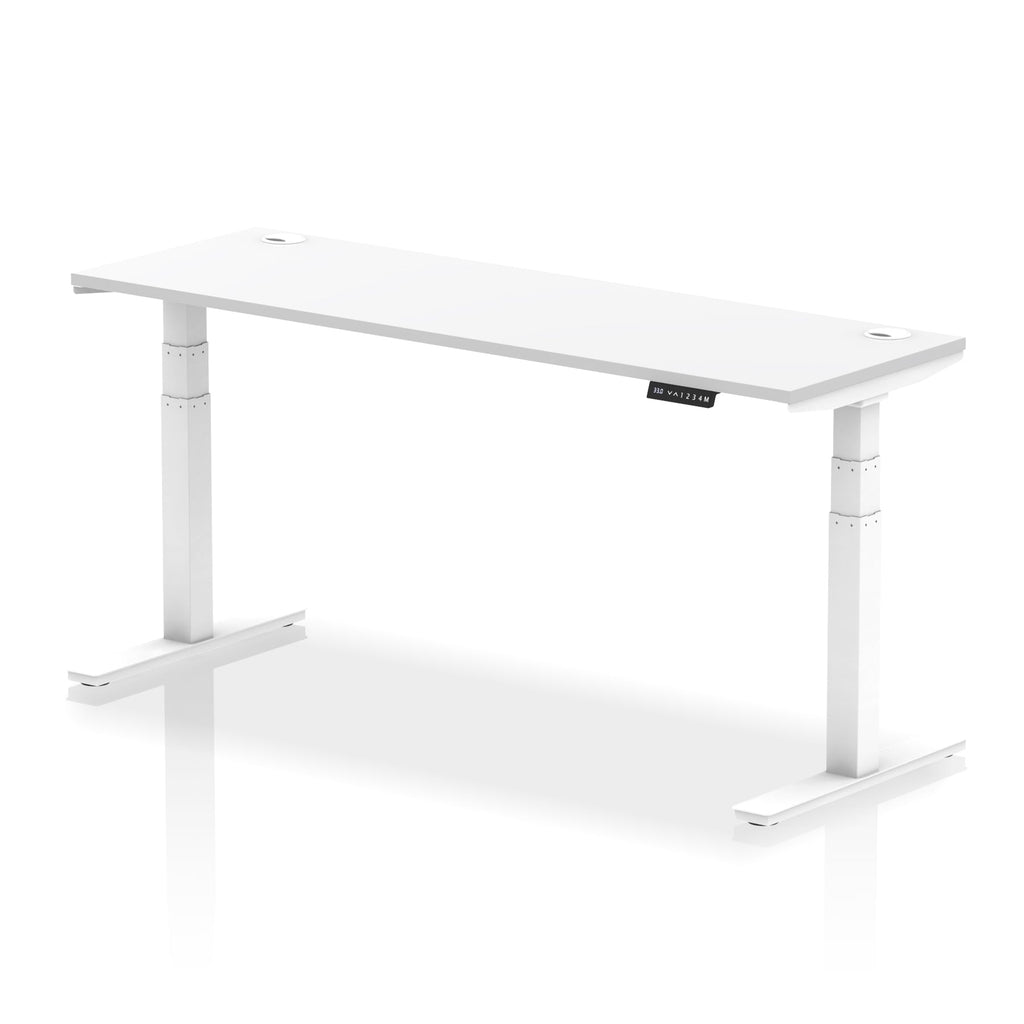 Adjustable height desk with white top and metal legs on a white background