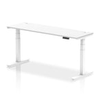 Adjustable height desk with white top and metal legs on a white background
