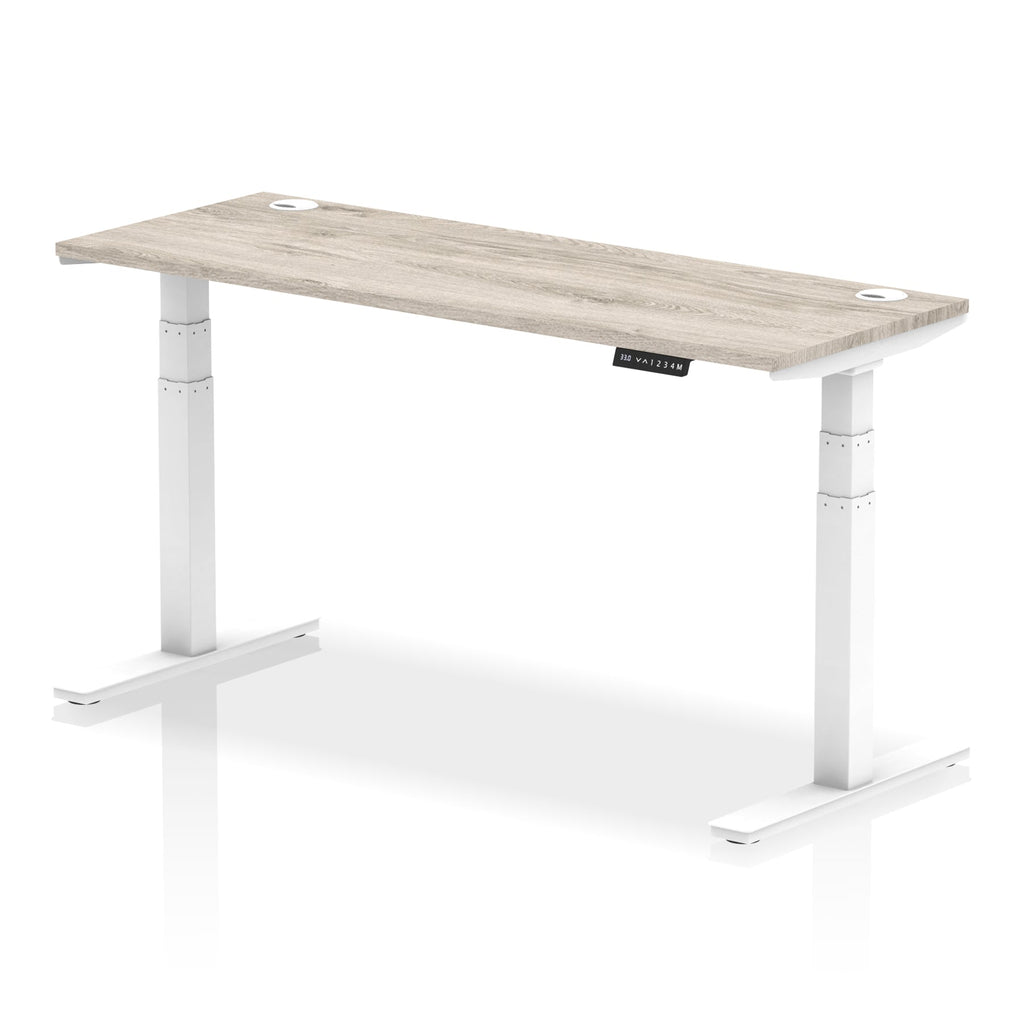 Adjustable height desk with wood-effect top and metal legs on a white background