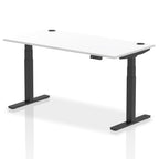 Adjustable height desk with white top and metal legs on a white background