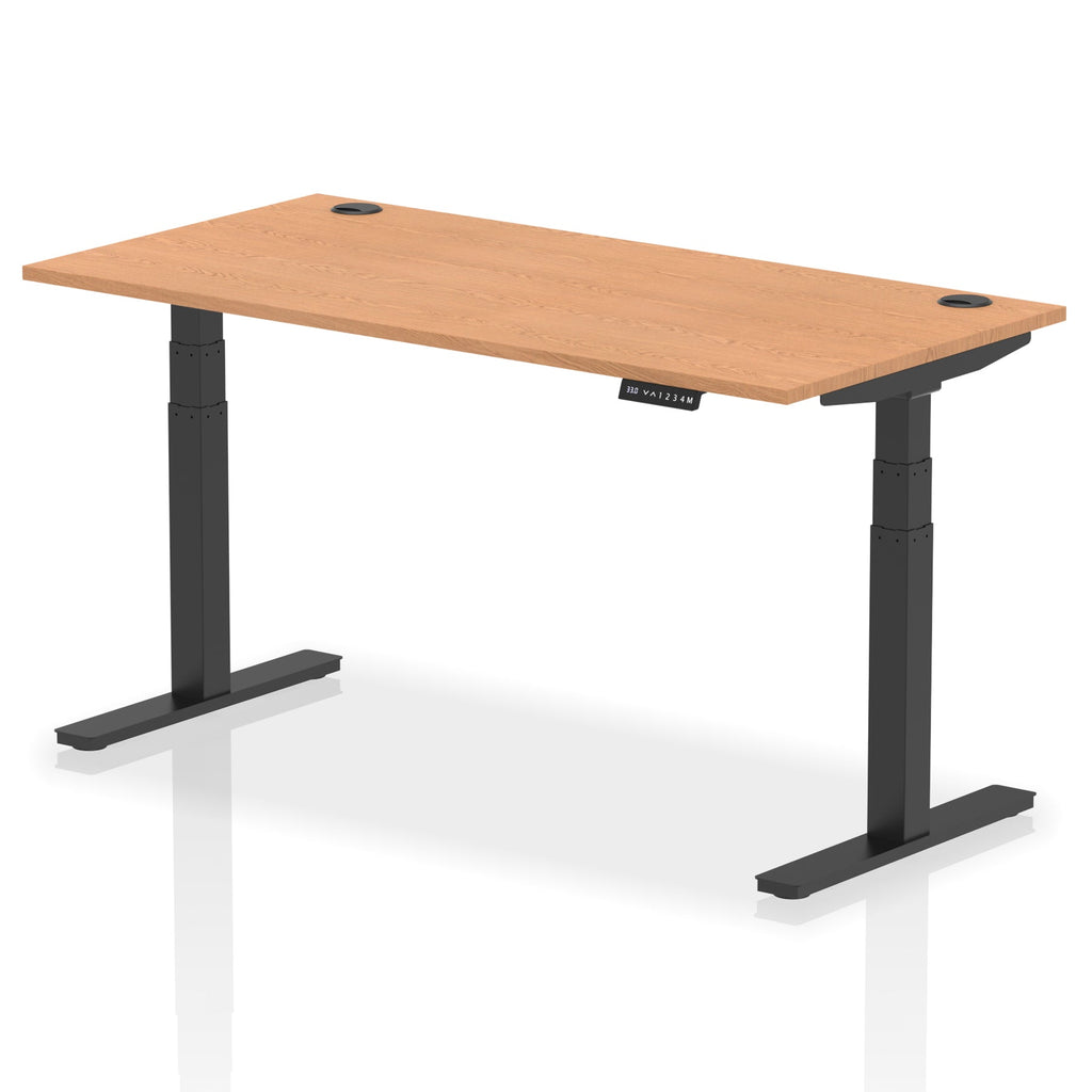 Adjustable height desk with wood-effect top and metal legs on a white background
