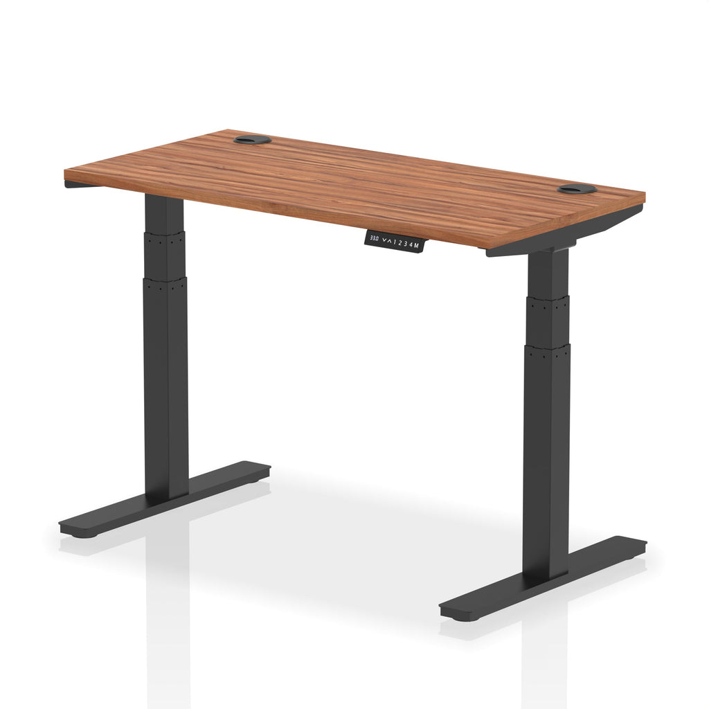 Adjustable height desk with wood-effect top and metal legs on a white background
