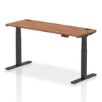 Adjustable height desk with wood-effect top and metal legs on a white background