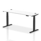 Adjustable height desk with white top and metal legs on a white background