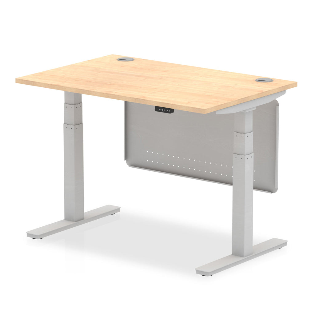 Adjustable height desk with wood-effect top and metal legs with modesty panel on a white background