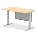 Adjustable height desk with wood-effect top and metal legs with modesty panel on a white background