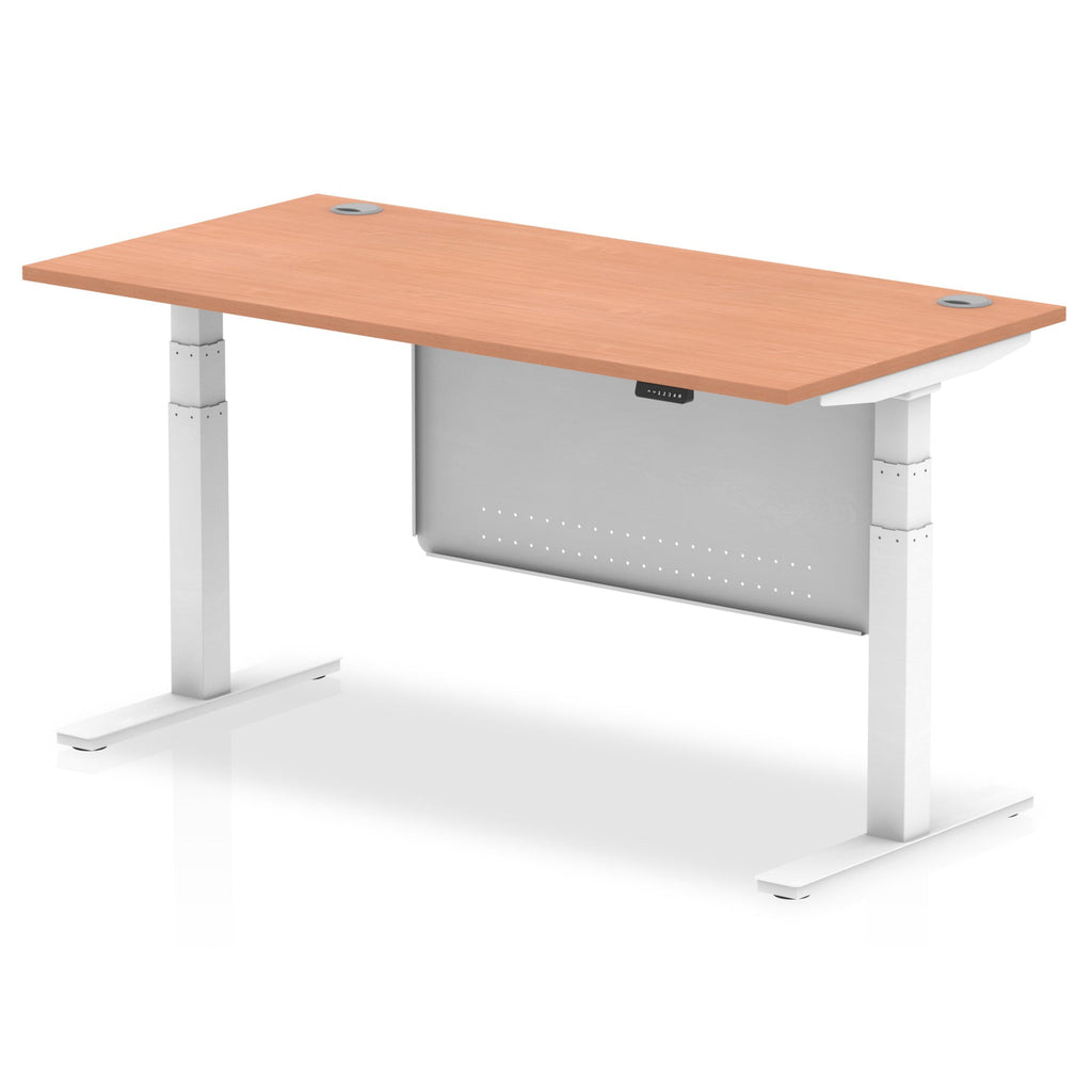 Adjustable height desk with wood-effect top and metal legs with modesty panel on a white background