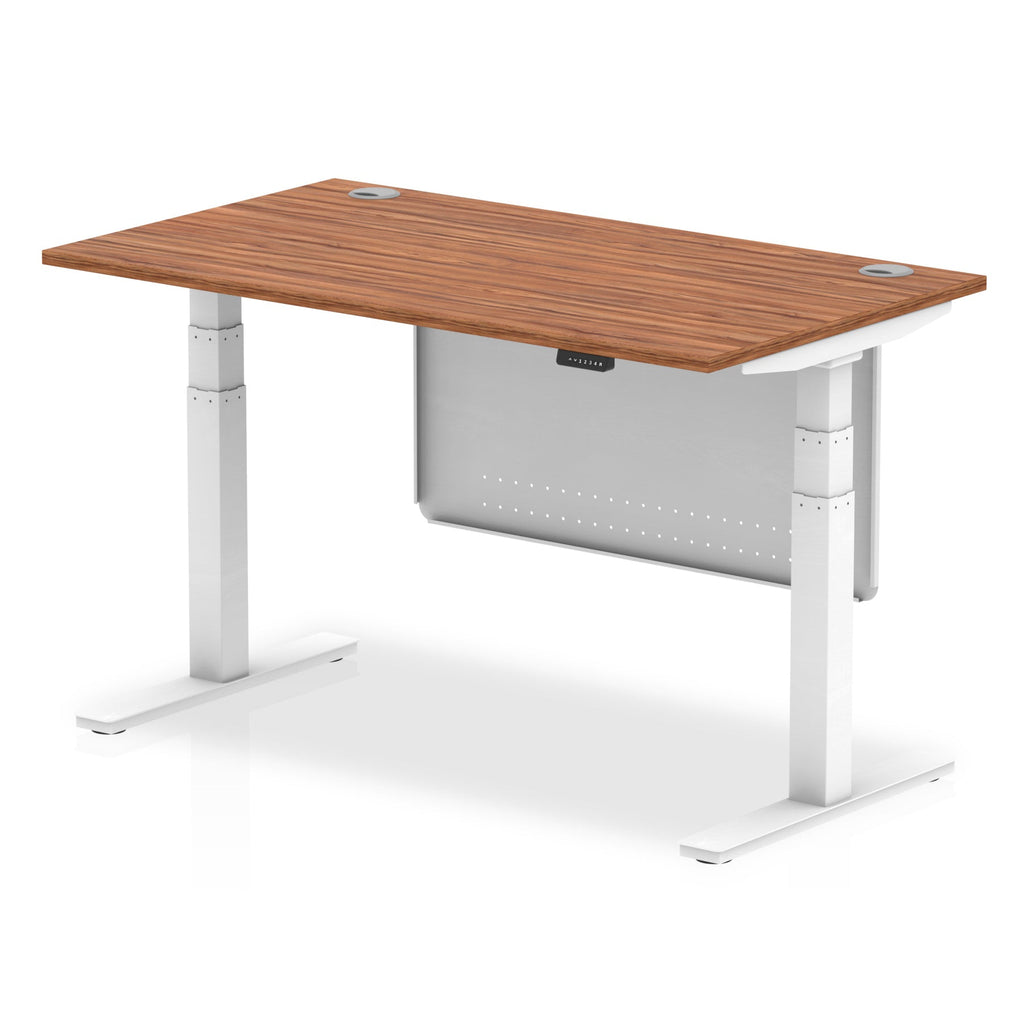 Adjustable height desk with wood-effect top and metal legs with modesty panel on a white background