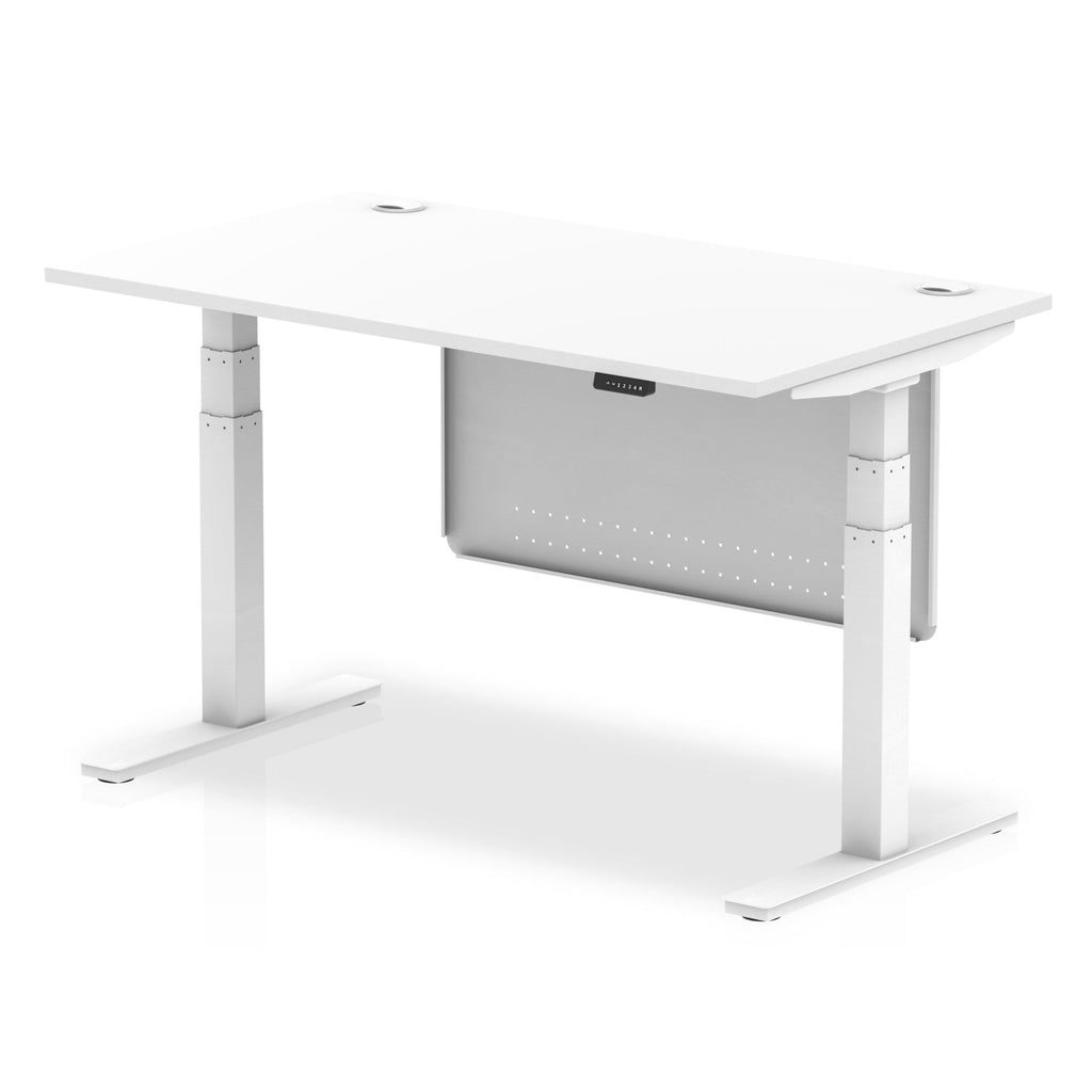 Adjustable height desk with white top and metal legs with modesty panel on a white background