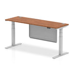 Height-adjustable desk with wood-effect top and metal legs on a white background