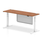 Height-adjustable desk with wood-effect top and metal legs on a white background