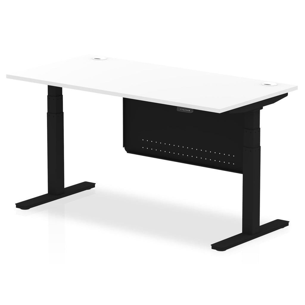 Adjustable height desk with white top and metal legs with modesty panel on a white background