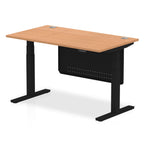 Adjustable height desk with wood-effect top and metal legs with modesty panel on a white background