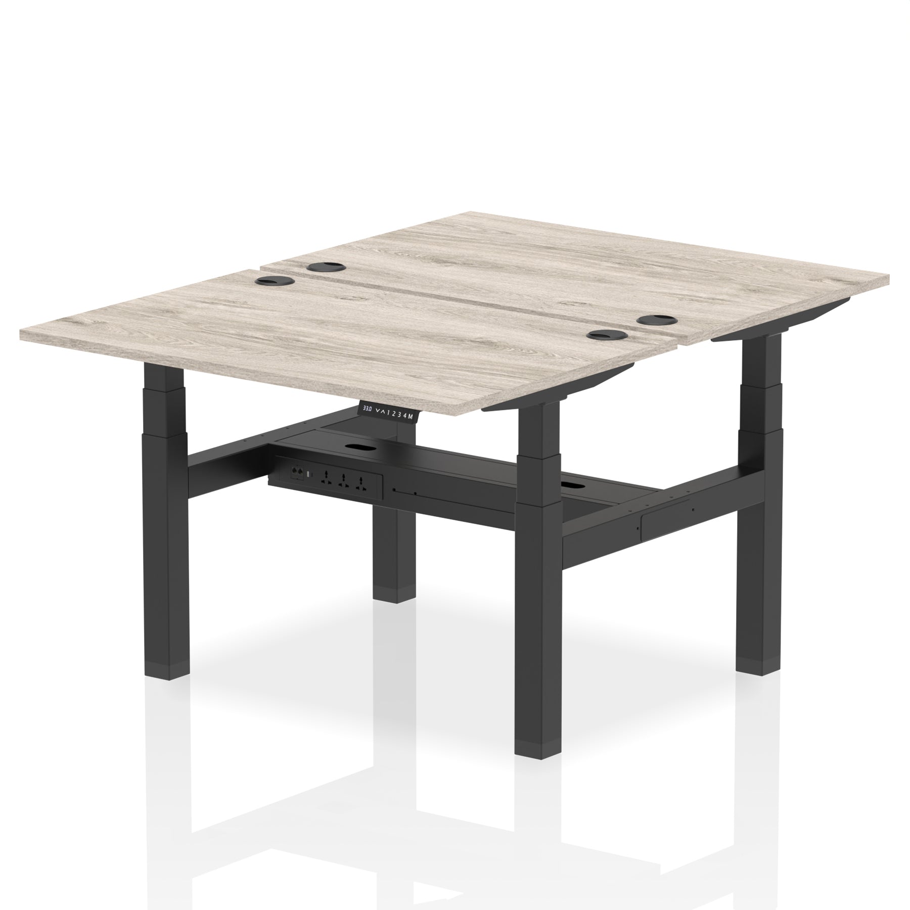 Back-to-back height adjustable desk with wood-effect top and metal frame on a white background