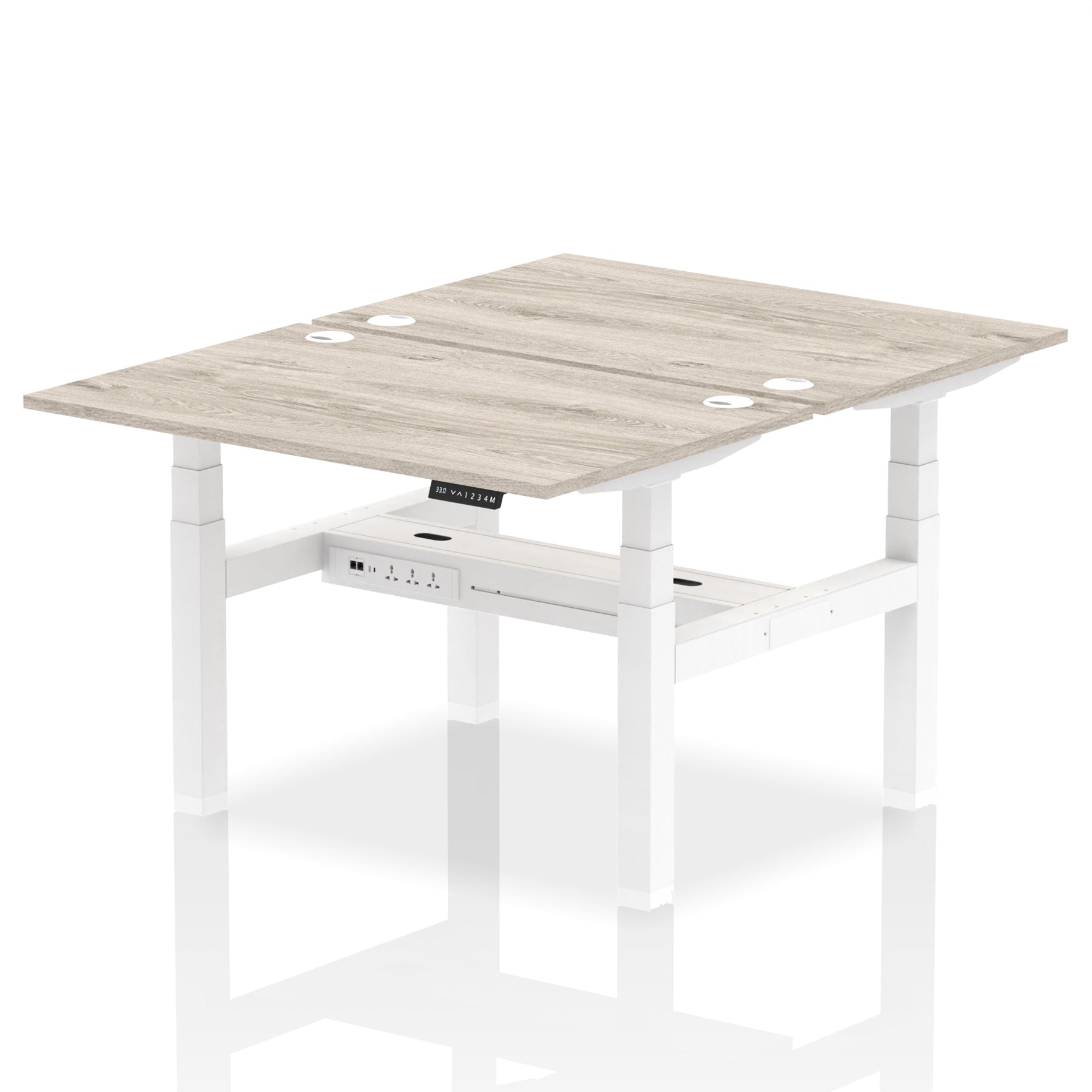 Back-to-back height adjustable desk with wood-effect top and metal frame on a white background