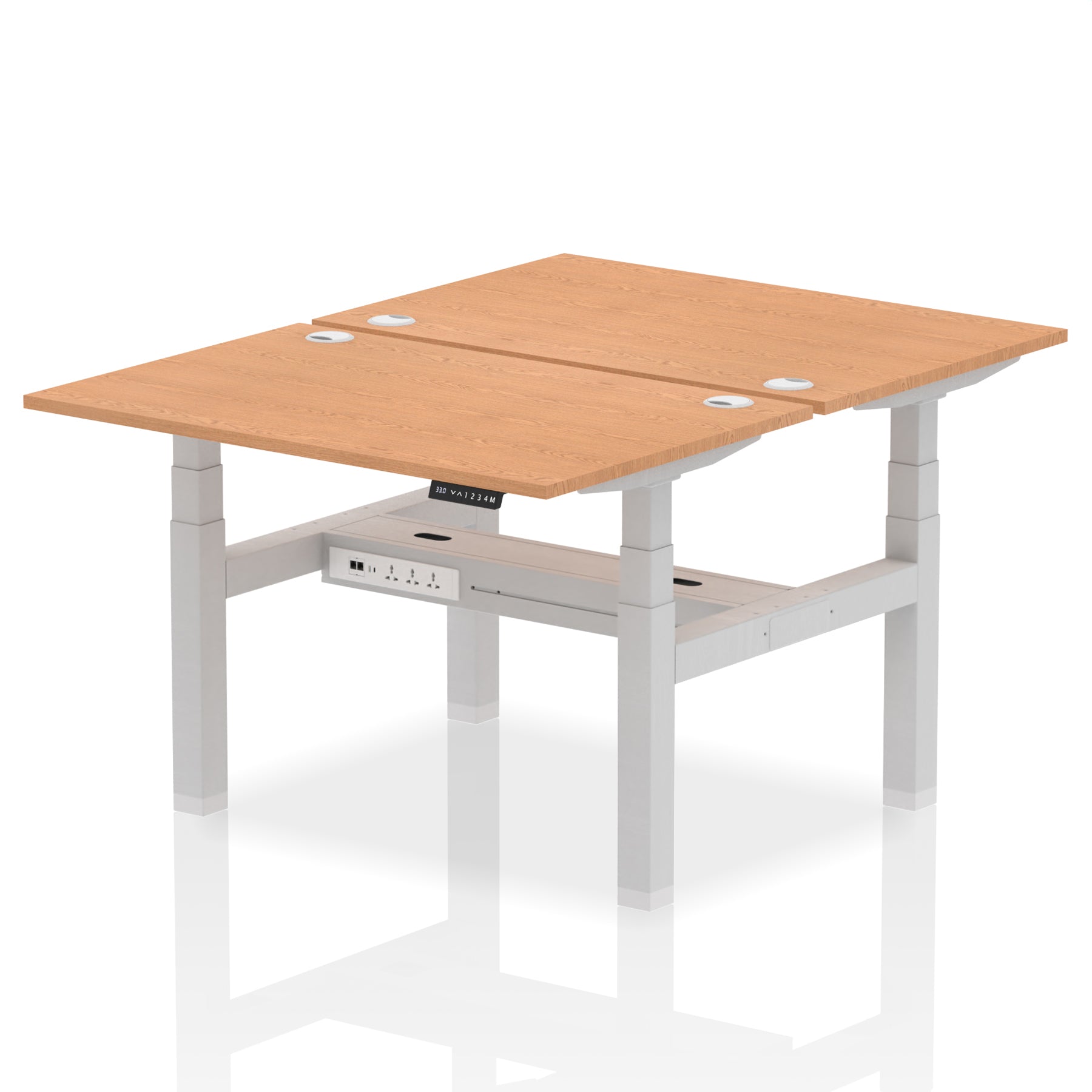 Back-to-back height adjustable desk with wood-effect top and metal frame on a white background