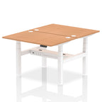 Back-to-back height adjustable desk with wood-effect top and metal frame on a white background