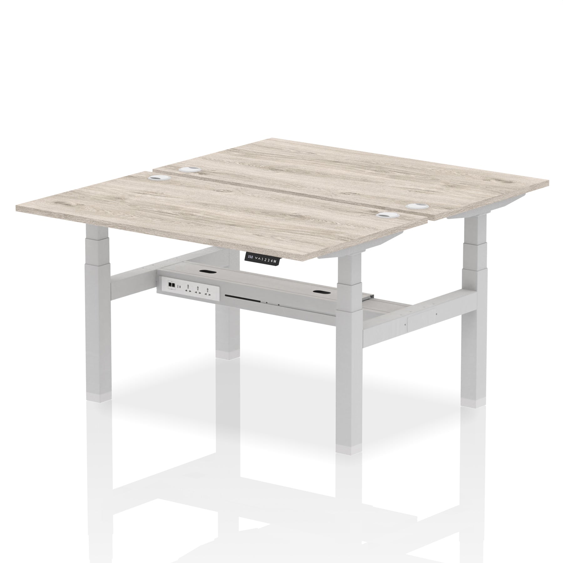 Back-to-back height adjustable desk with wood-effect top and metal frame on a white background