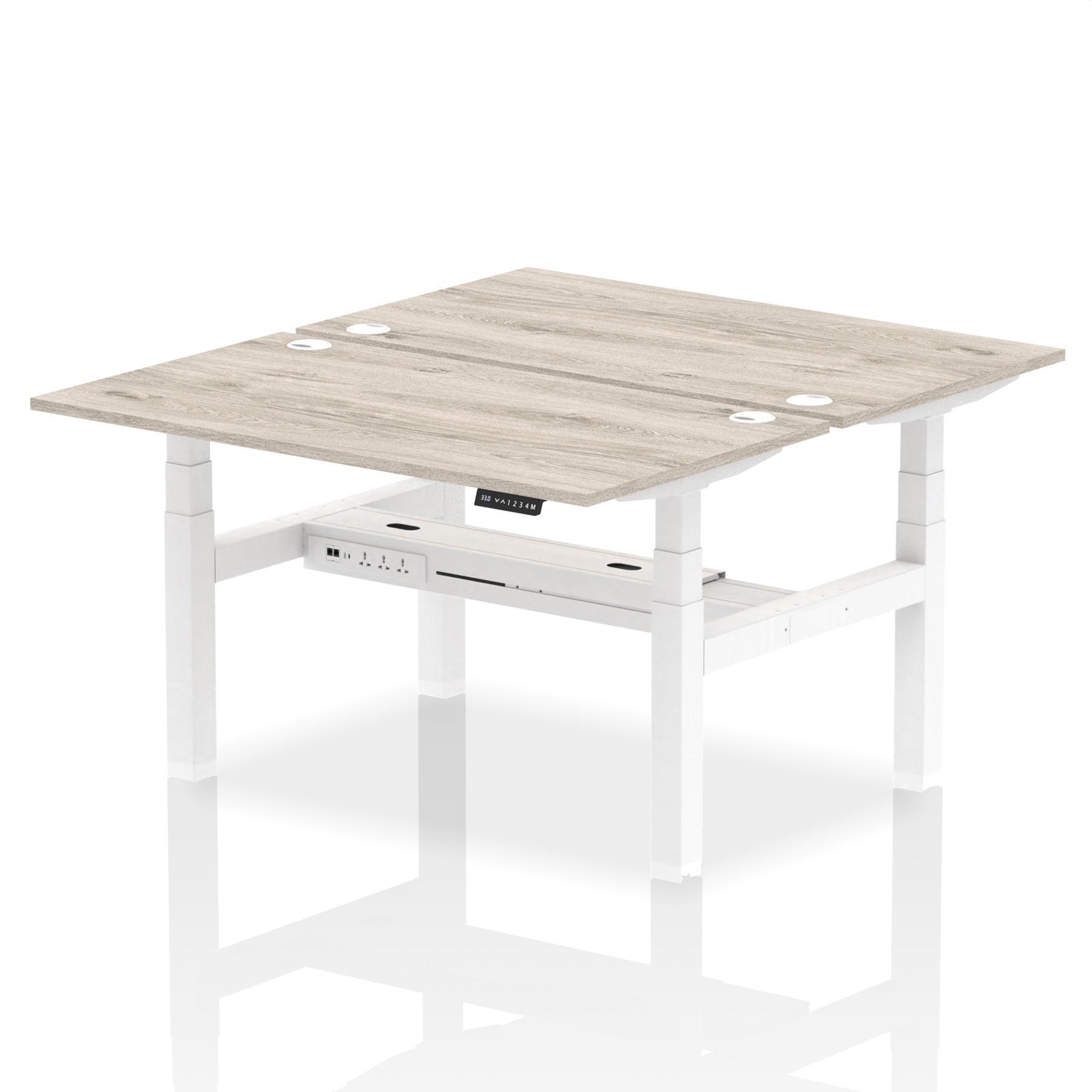 Back-to-back height adjustable desk with wood-effect top and metal frame on a white background