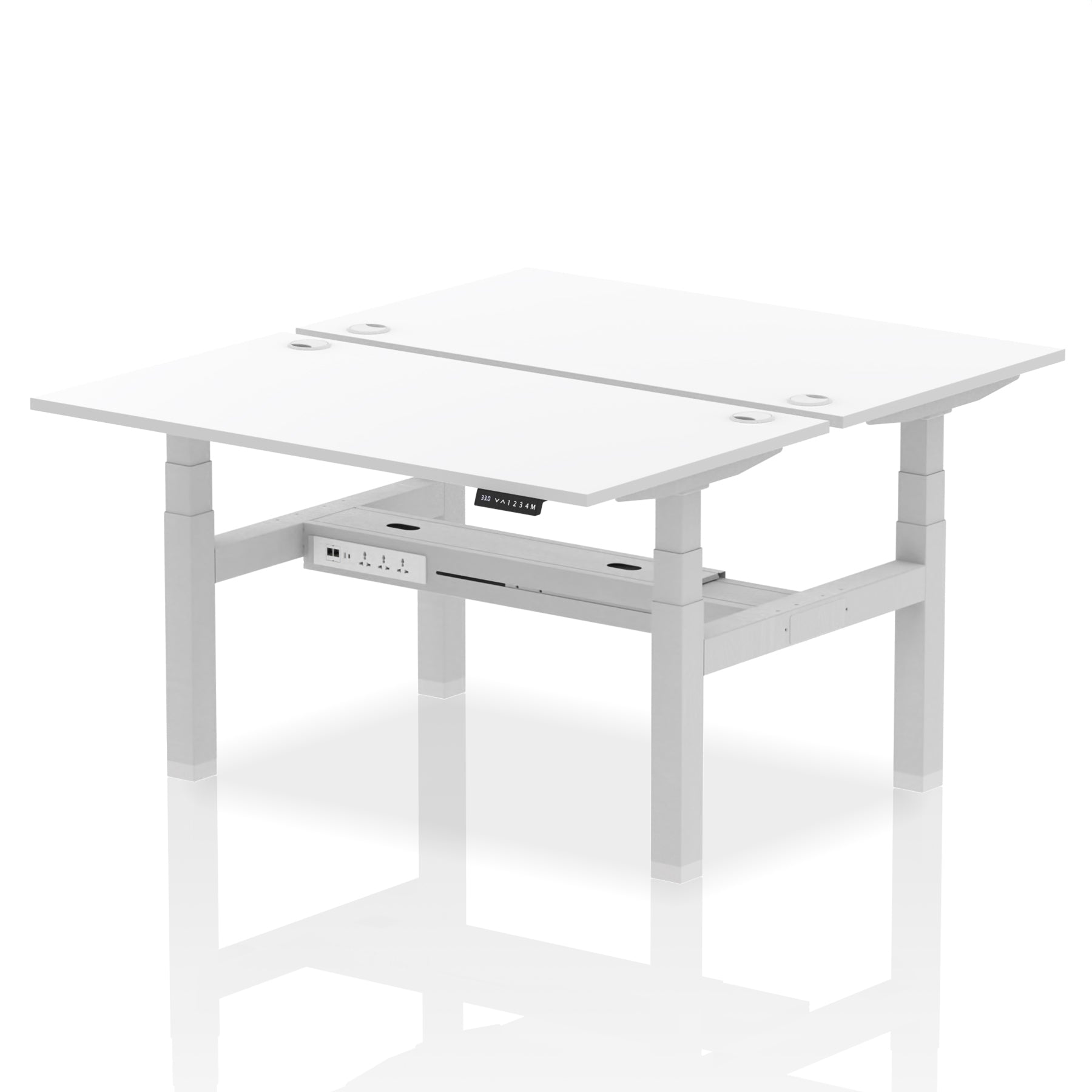 Back-to-back height adjustable desk with white top and metal frame on a white background