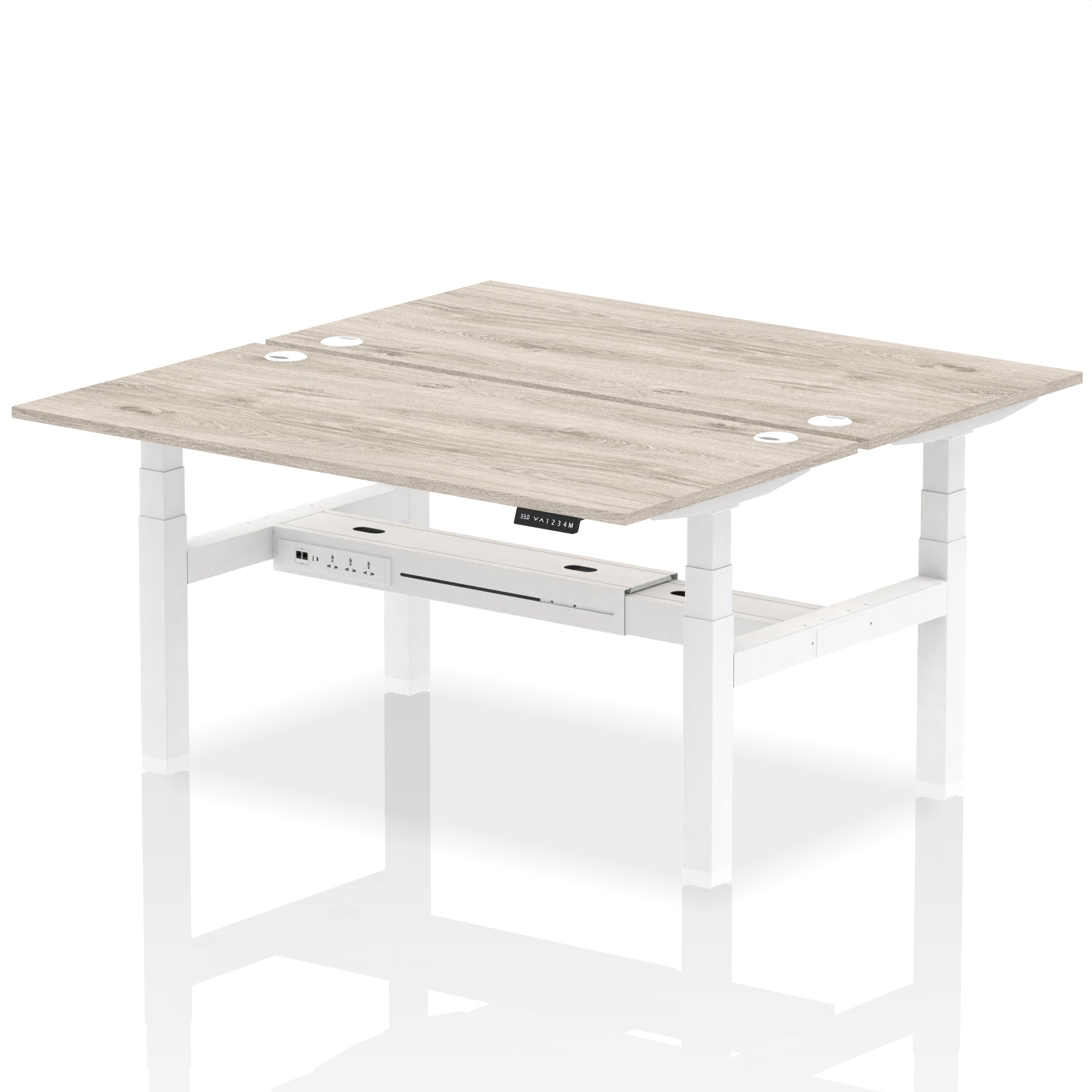 Back-to-back height adjustable desk with wood-effect top and metal frame on a white background