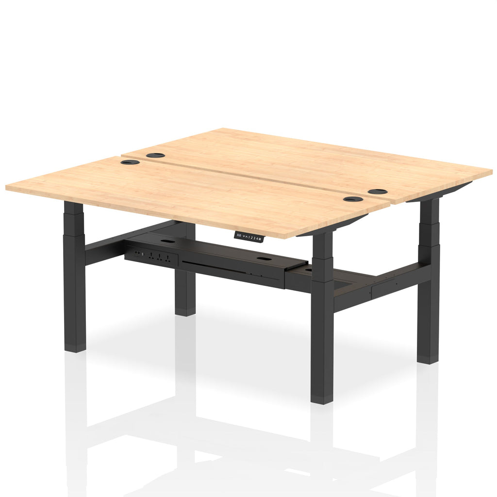 Back-to-back height adjustable desk with wood-effect top and metal frame on a white background