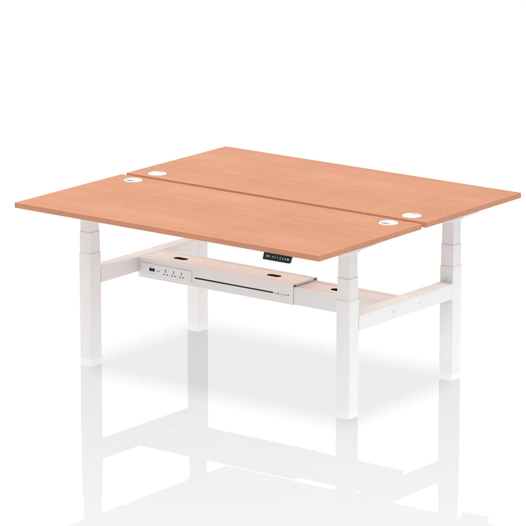 Back-to-back height adjustable desk with wood-effect top and metal frame on a white background