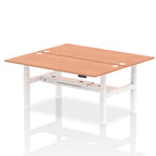 Back-to-back height adjustable desk with wood-effect top and metal frame on a white background