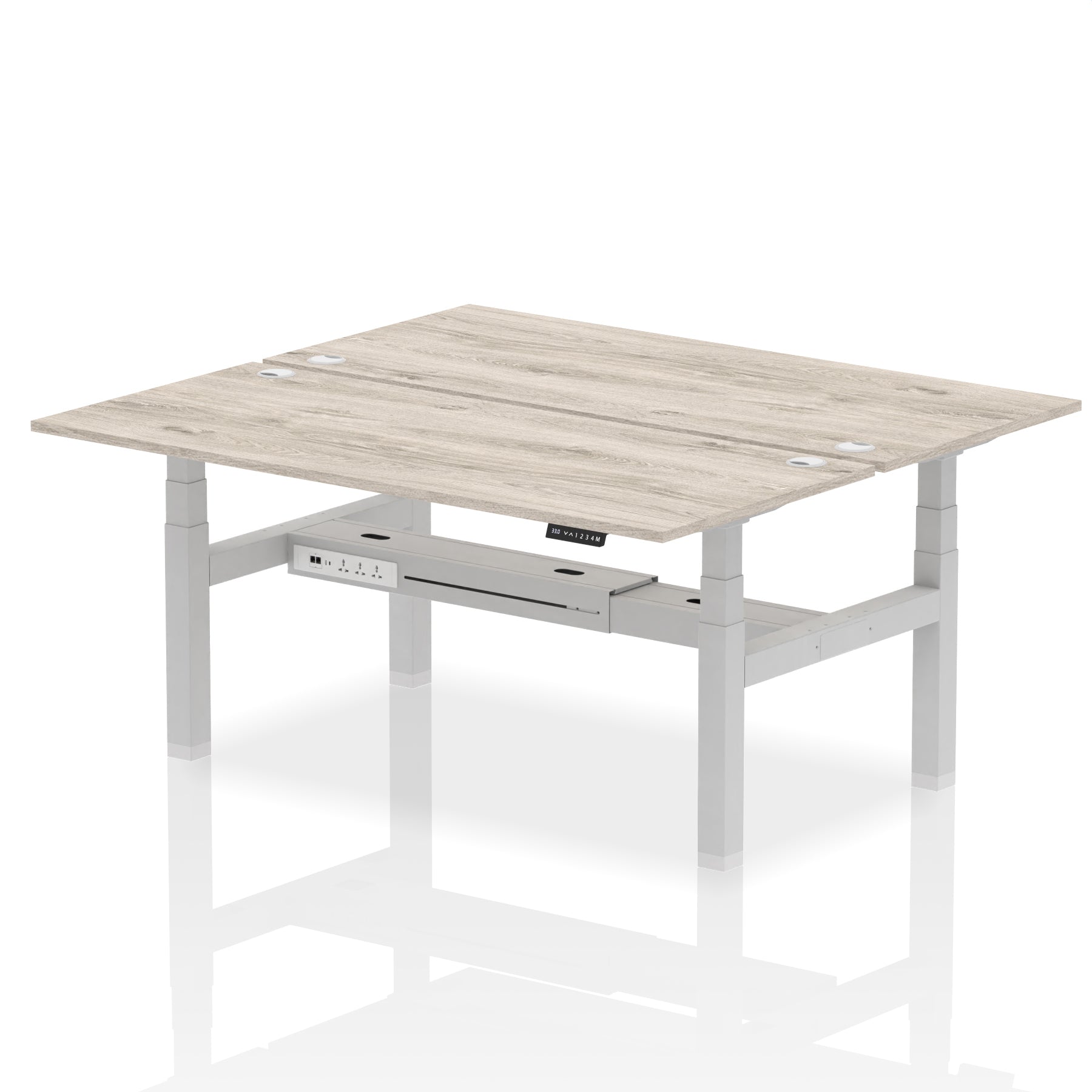 Back-to-back height adjustable desk with wood-effect top and metal frame on a white background