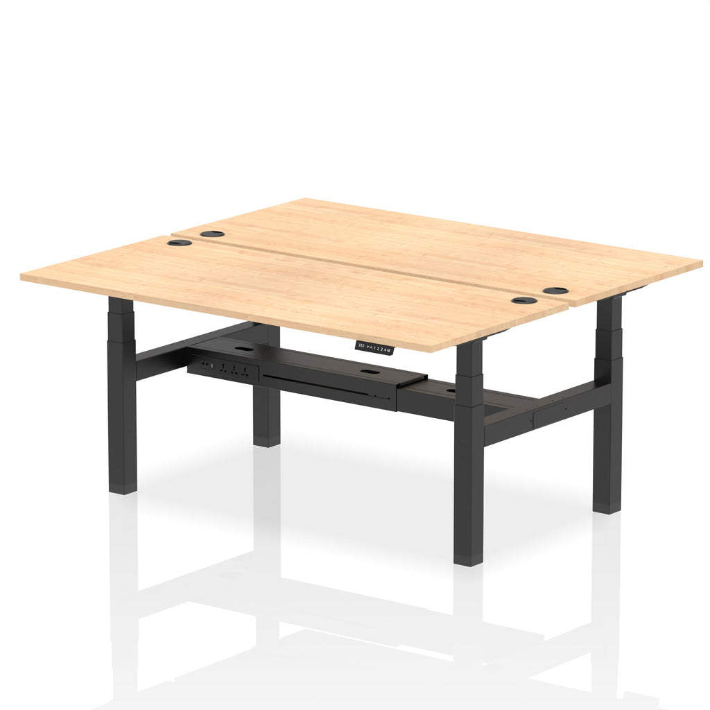 Back-to-back height adjustable desk with wood-effect top and metal frame on a white background