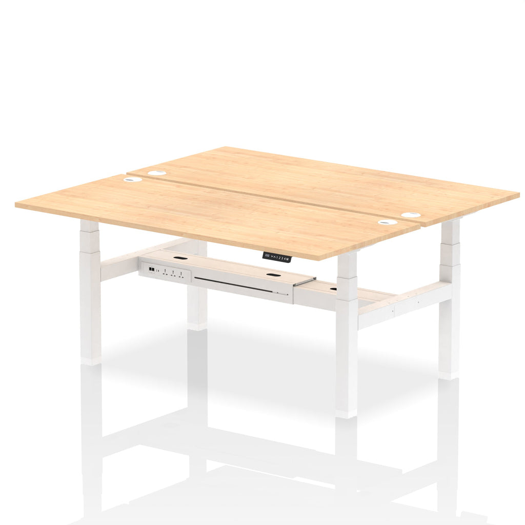 Back-to-back height adjustable desk with wood-effect top and metal frame on a white background