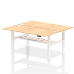 Back-to-back height adjustable desk with wood-effect top and metal frame on a white background