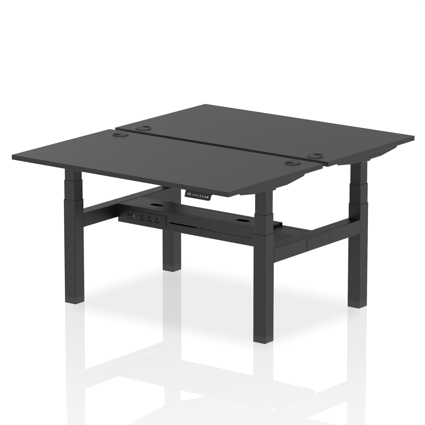 Back-to-back height adjustable desk with black top and metal frame on a white background