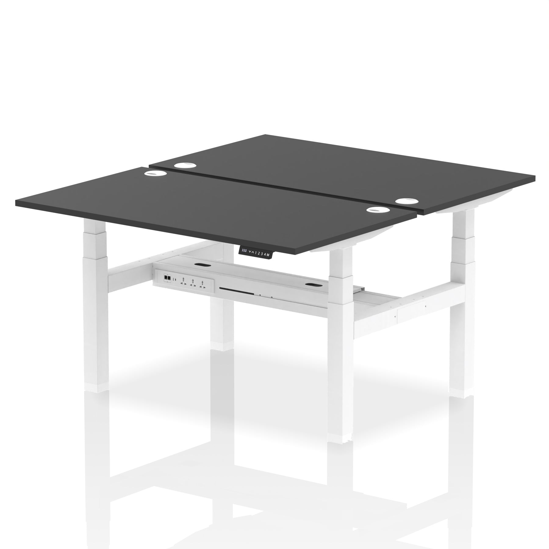Back-to-back height adjustable desk with black top and metal frame on a white background