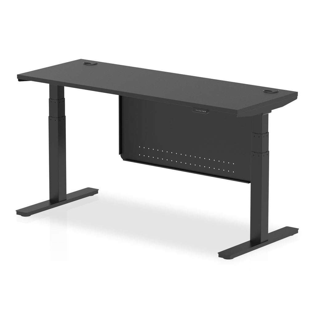 Height-adjustable desk with black top and metal legs on a white background