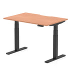Height adjustable desk with wood-effect top and black frame on a white background