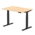 Height adjustable desk with wood-effect top and black frame on a white background