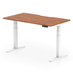 Height adjustable desk with wood-effect top and white frame on a white background