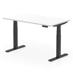 Height adjustable desk with white top and black frame on a white background
