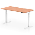 Height adjustable desk with wood-effect top and white frame on a white background