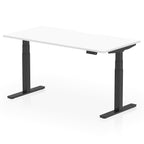 Height adjustable desk with white top and black frame on a white background
