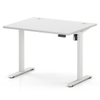 A white adjustable height standing desk with a rectangular top, two metal legs with footrests, and a small control panel on the right side, shown on a clean white background.