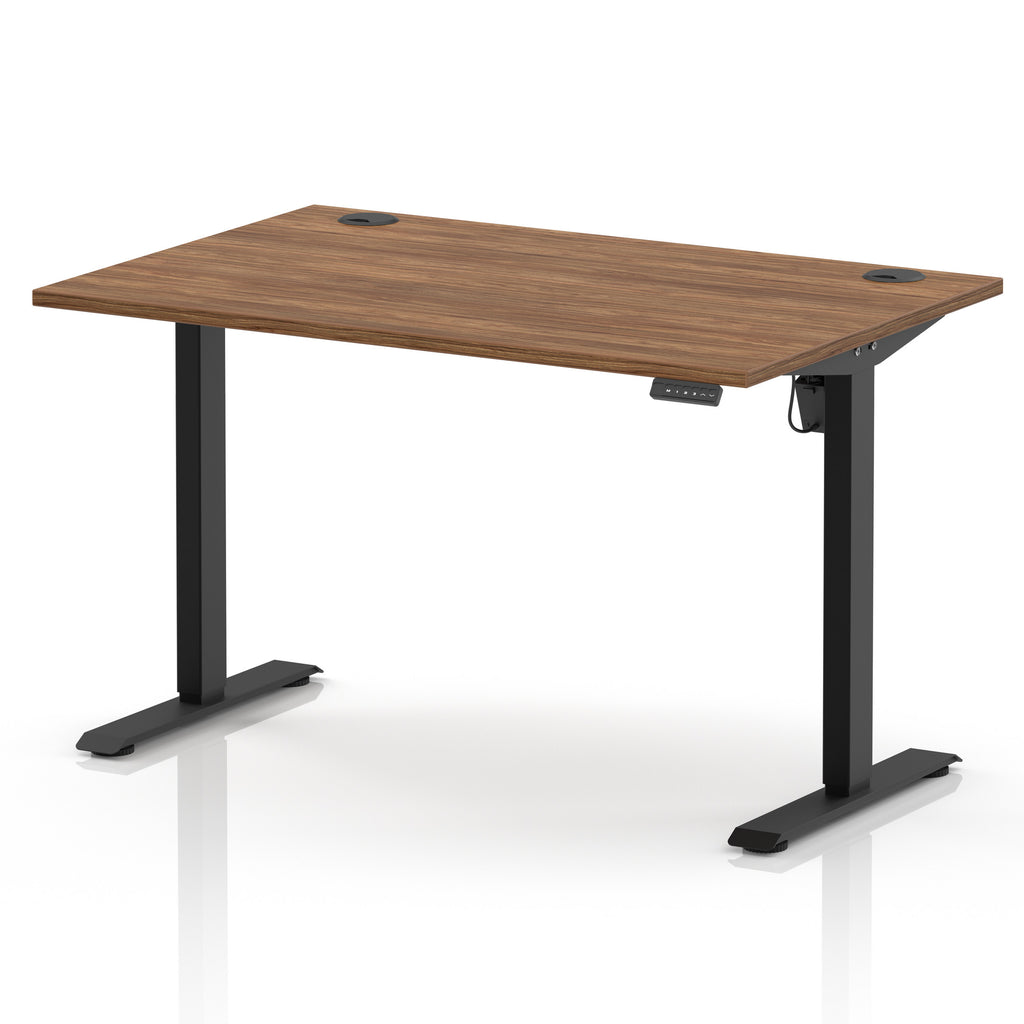 An adjustable height standing desk with a medium brown wood-grain desktop and black metal legs, shown on a clean white background.
