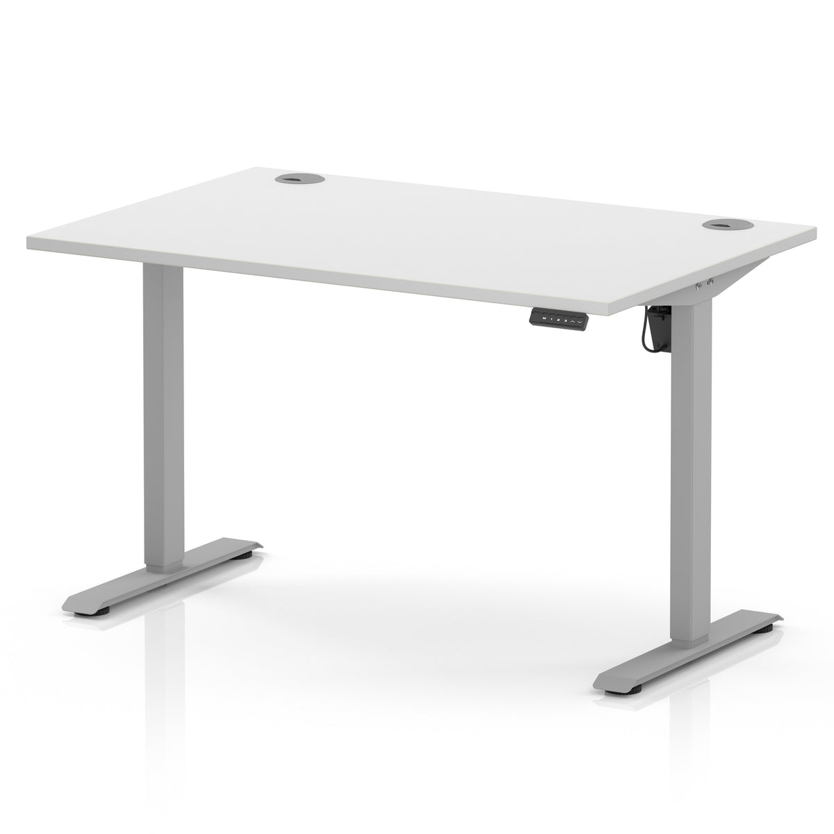 A white height-adjustable standing desk with a silver metal T-style base, featuring cable grommets on the top surface and a control panel on the right side.