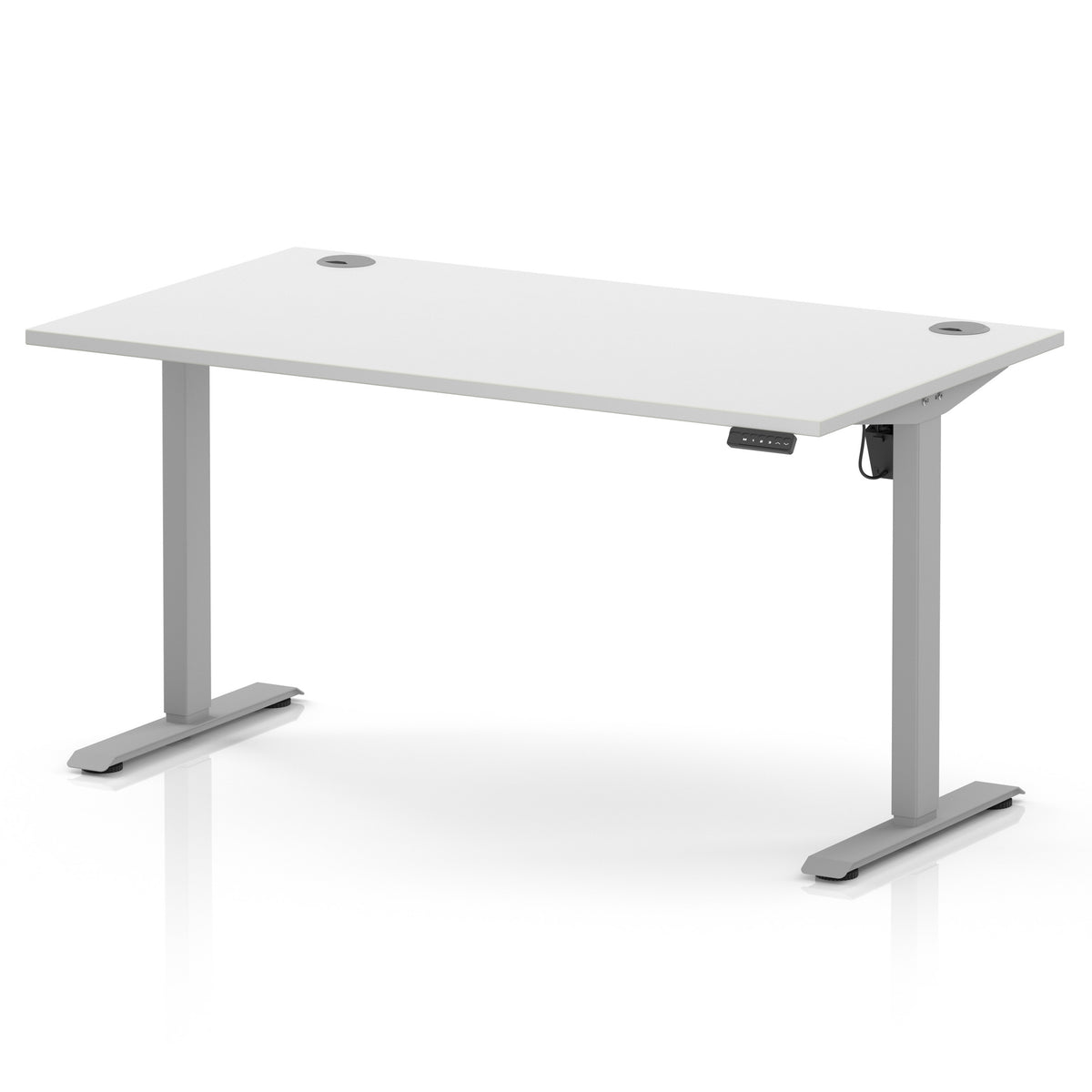 A modern white height-adjustable standing desk with a sleek gray metal T-style frame, featuring a small control panel on the right side and circular cable grommets on the top surface.
