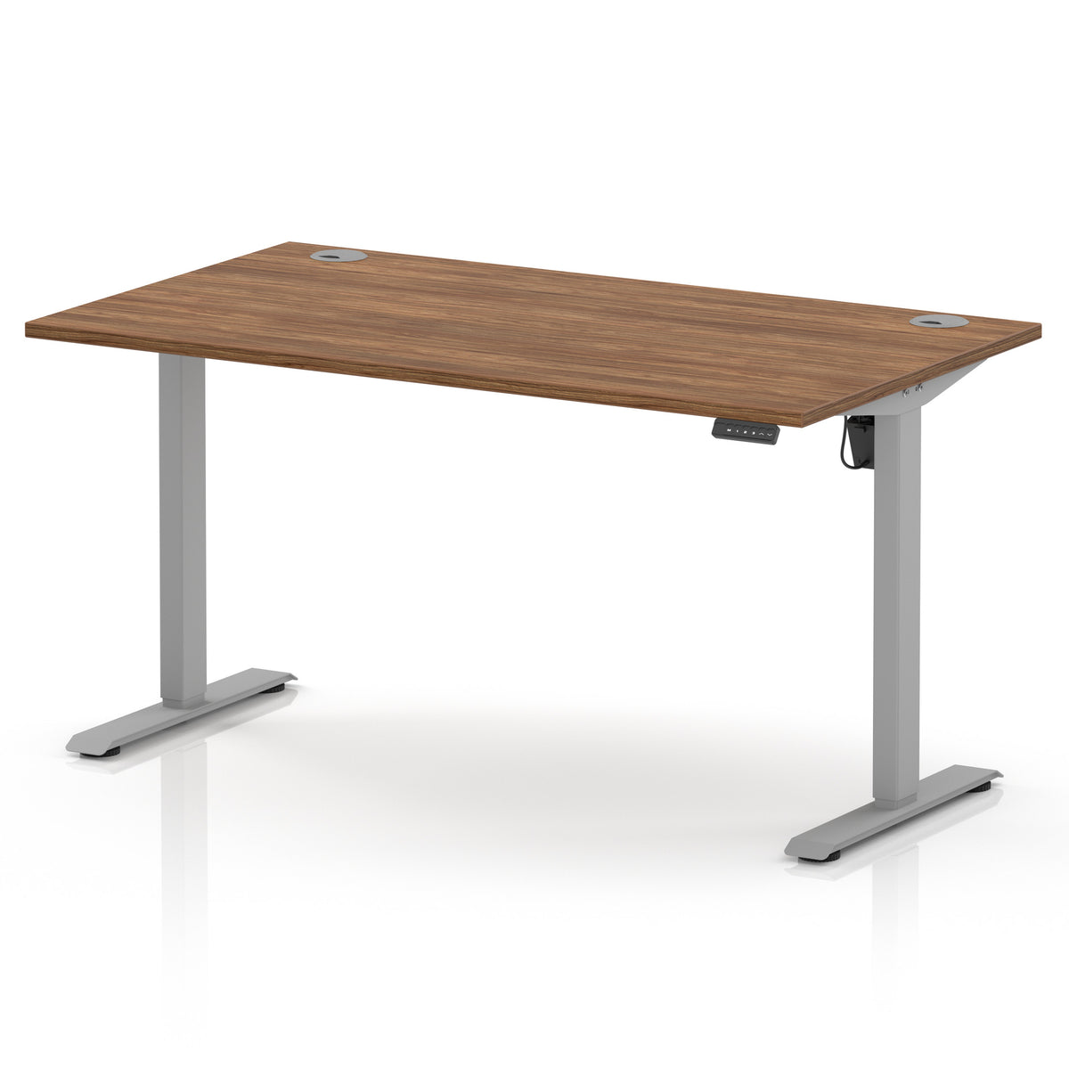 An adjustable standing desk with a medium brown wood-grain desktop and a silver metal frame with T-style legs, shown on a white background.
